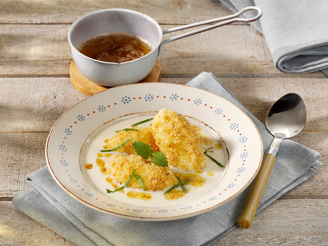 Soup with curd cheese dumplings