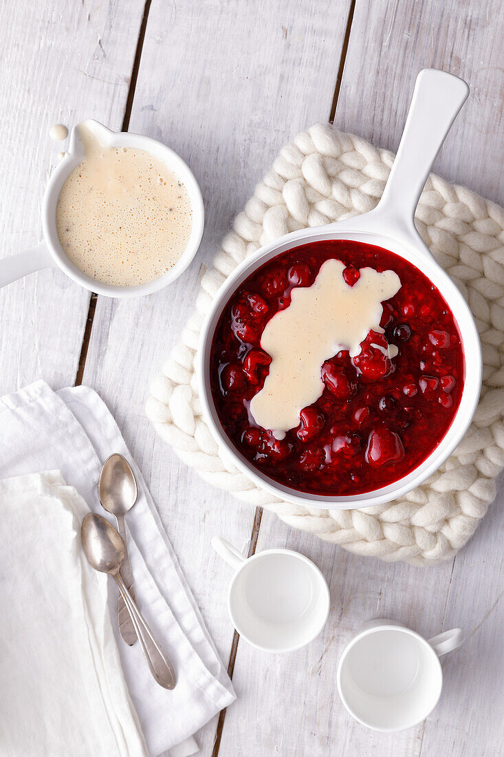 Red fruit jelly with cashew-vanilla sauce