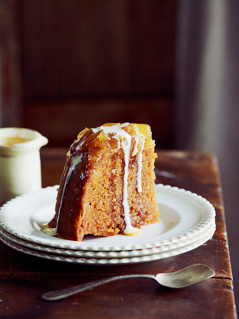 Steamed caramel ginger pudding with vanilla sauce