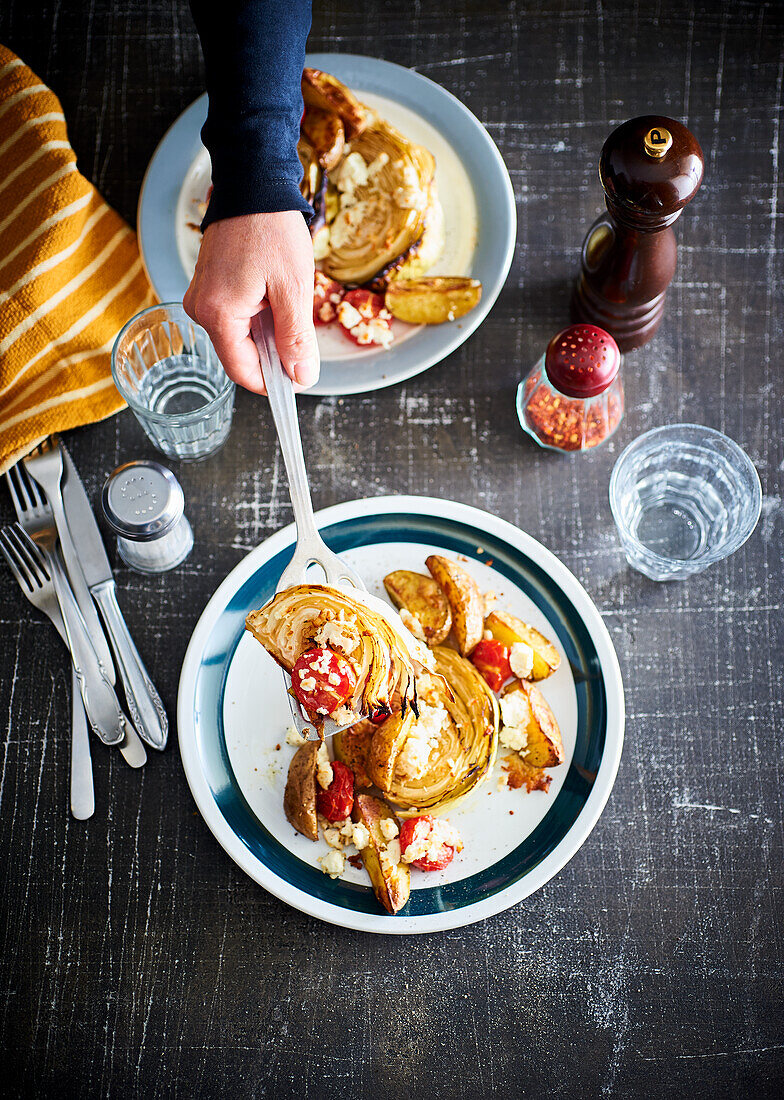 White cabbage with feta and potato wedges