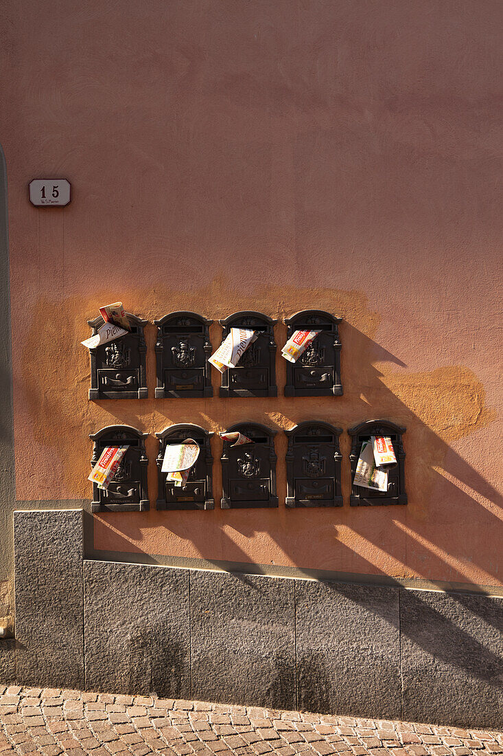 Historic letterboxes on the house wall, Piedmont, Italy