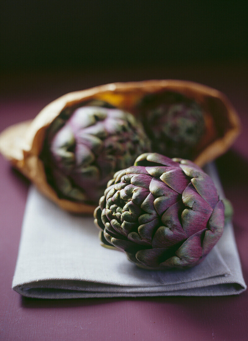 Globe artichokes in paper bag