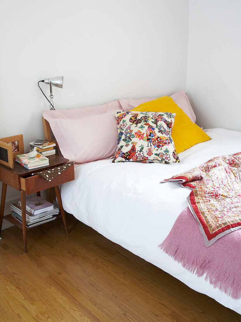 Double bedroom with cushions and blankets