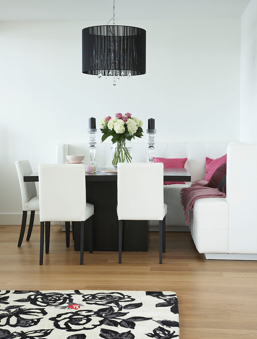 Dining room with white bench seat