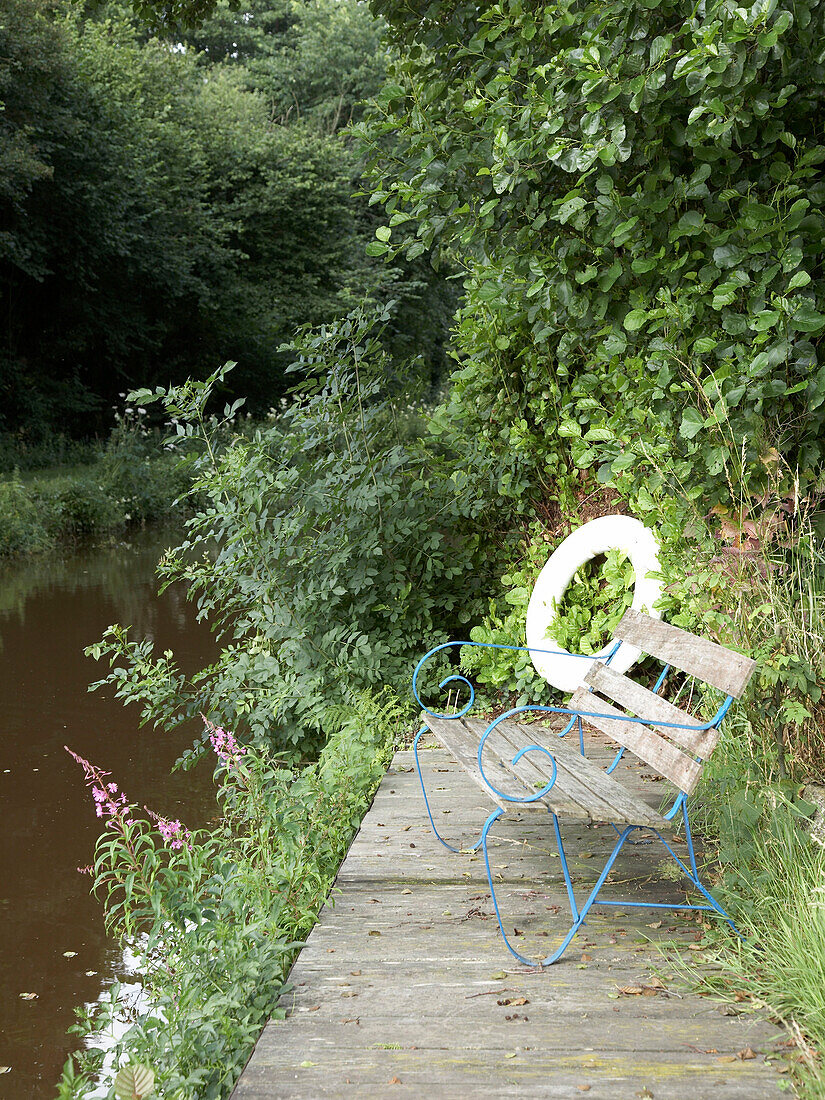 Bench next to canal