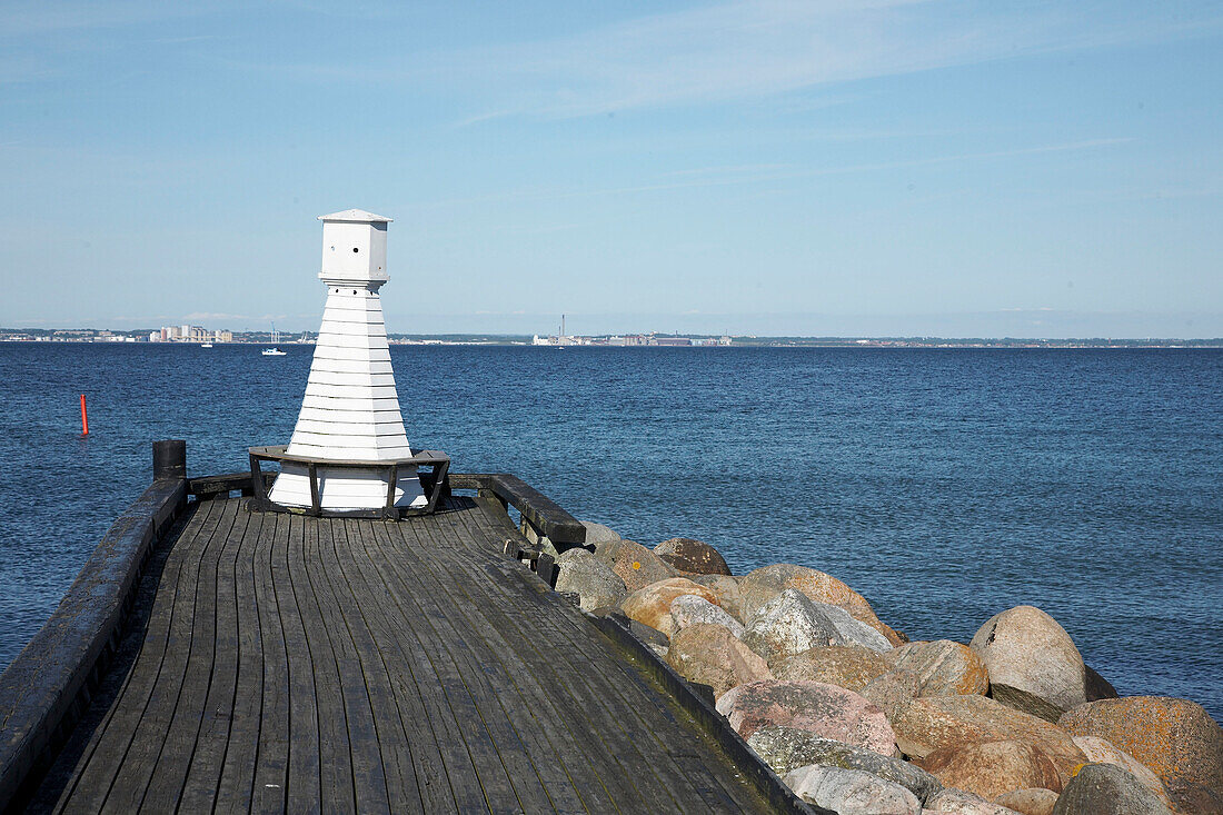 Wooden jetty with view out to sea