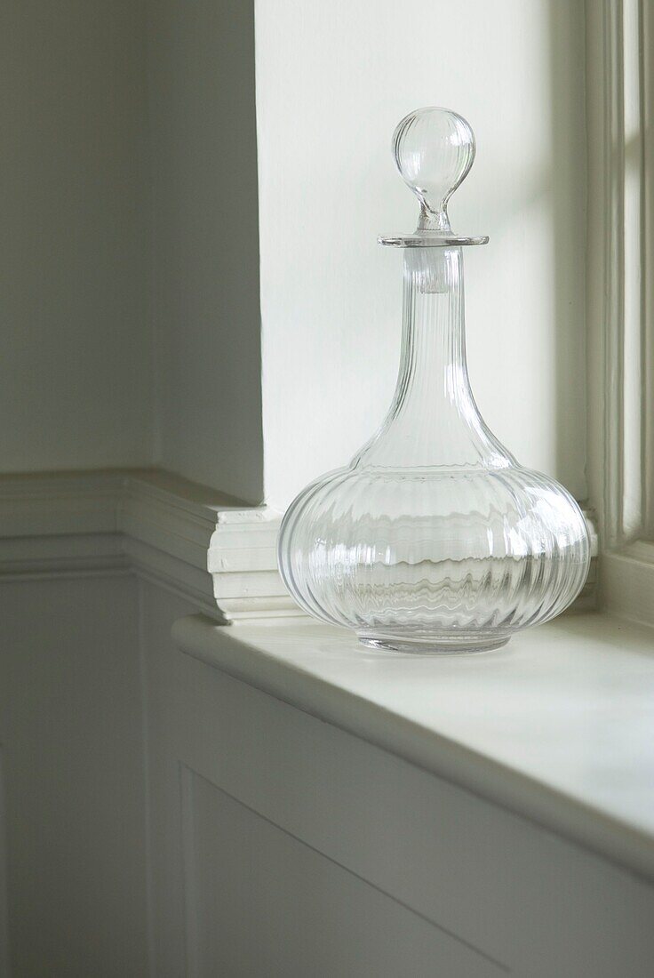 Decanter on window sill