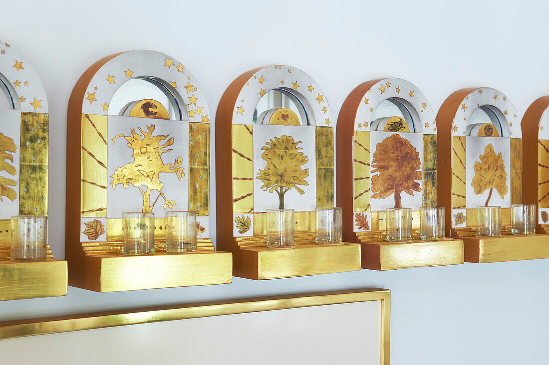 Candle holders on decorative wall mounted shelves in Massachusetts home, New England, USA