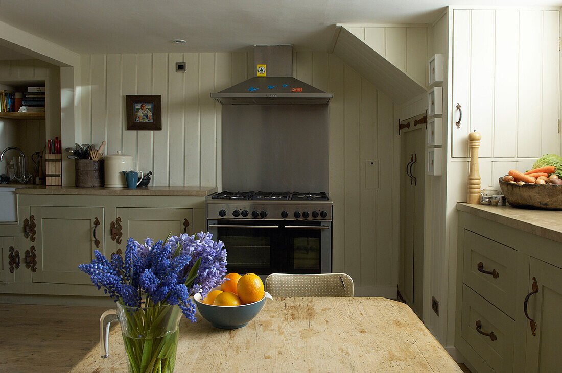 A neutral pared back colour scheme with natural wooden floor gives an airy feel Hastings beach house England UK