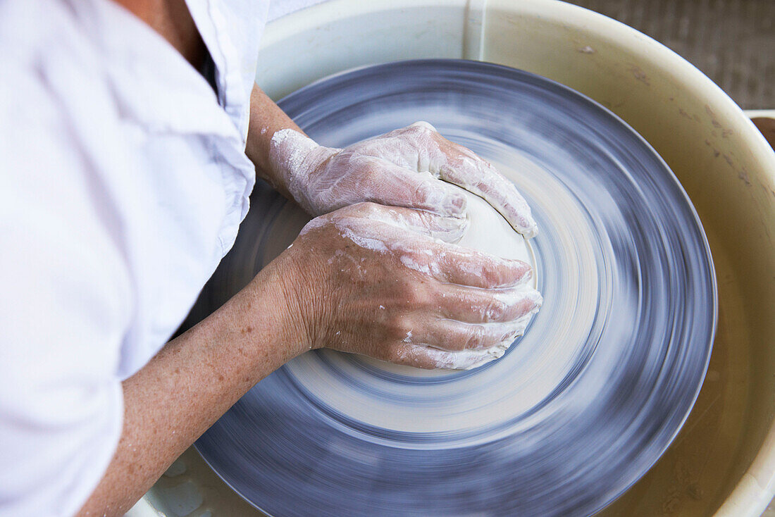 Woman working on potters wheel, Austerlitz, Columbia County, New York, United States
