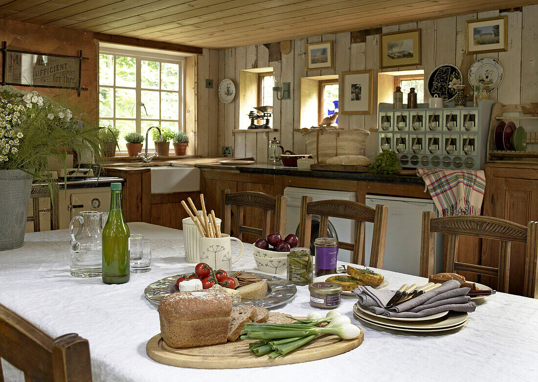 Open plan dining area and kitchen in converted Shropshire chapel England, UK