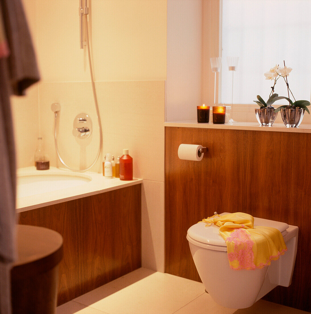 Contemporary wood panelled bathroom