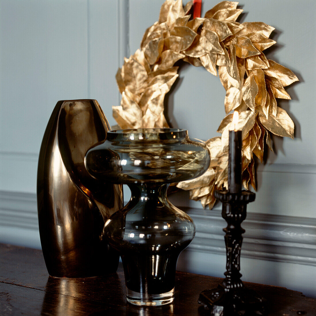 Sideboard with gold and black home wares