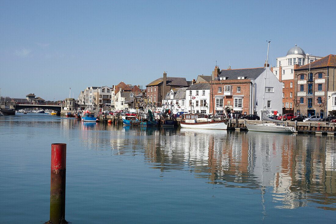 Water marker in Weymouth harbour, Dorset, UK