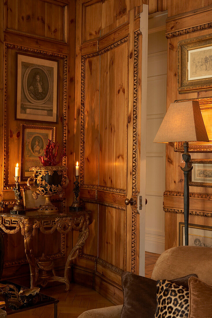 Classical style interior with ornate carved table