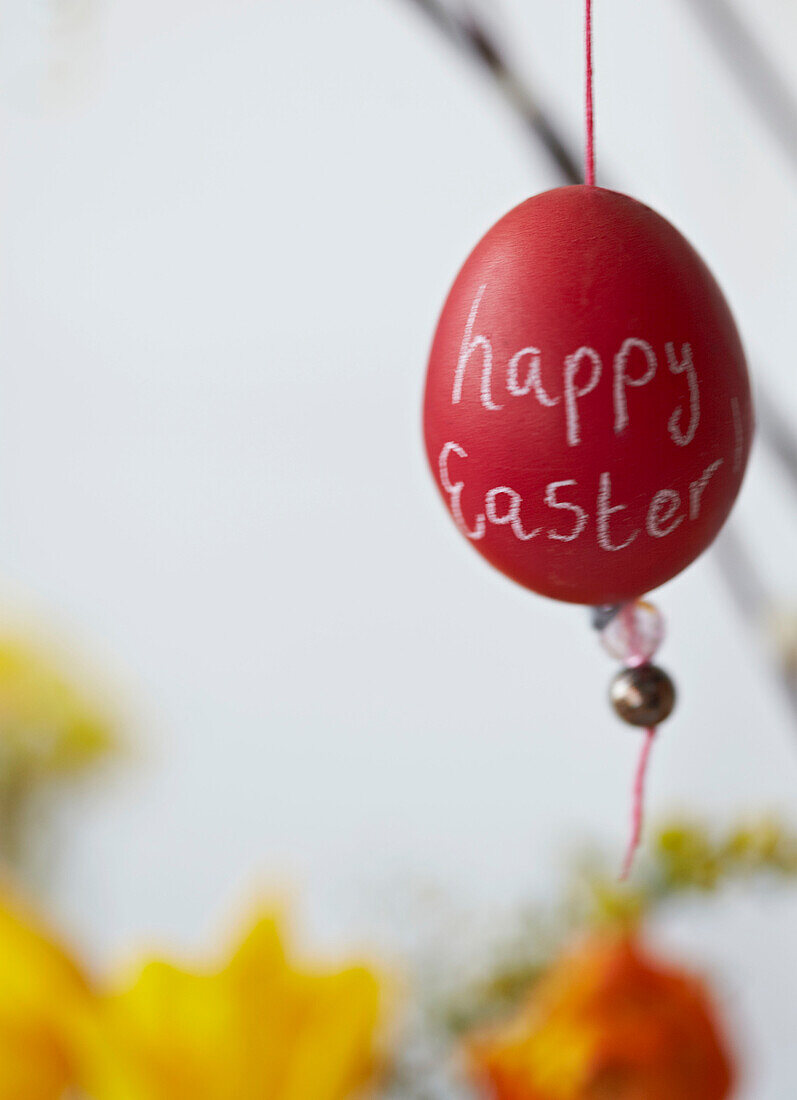 Decorated Easter Eggs tied with ribbon