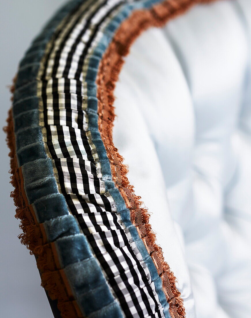 Upholstered chair back detail in Cumbria home, England, UK