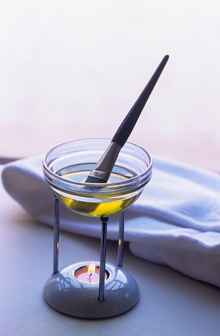 Essential oils heating in a burner in a Spa