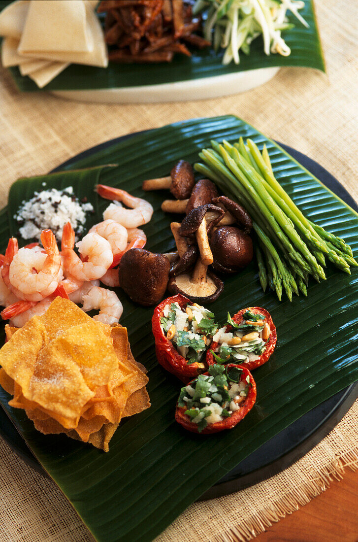 Asian antipasto on banana leaf