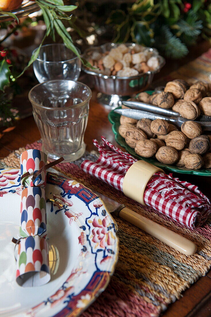 Dining table with place set for Christmas dinner in Benenden cottage,  Kent,  England,  UK