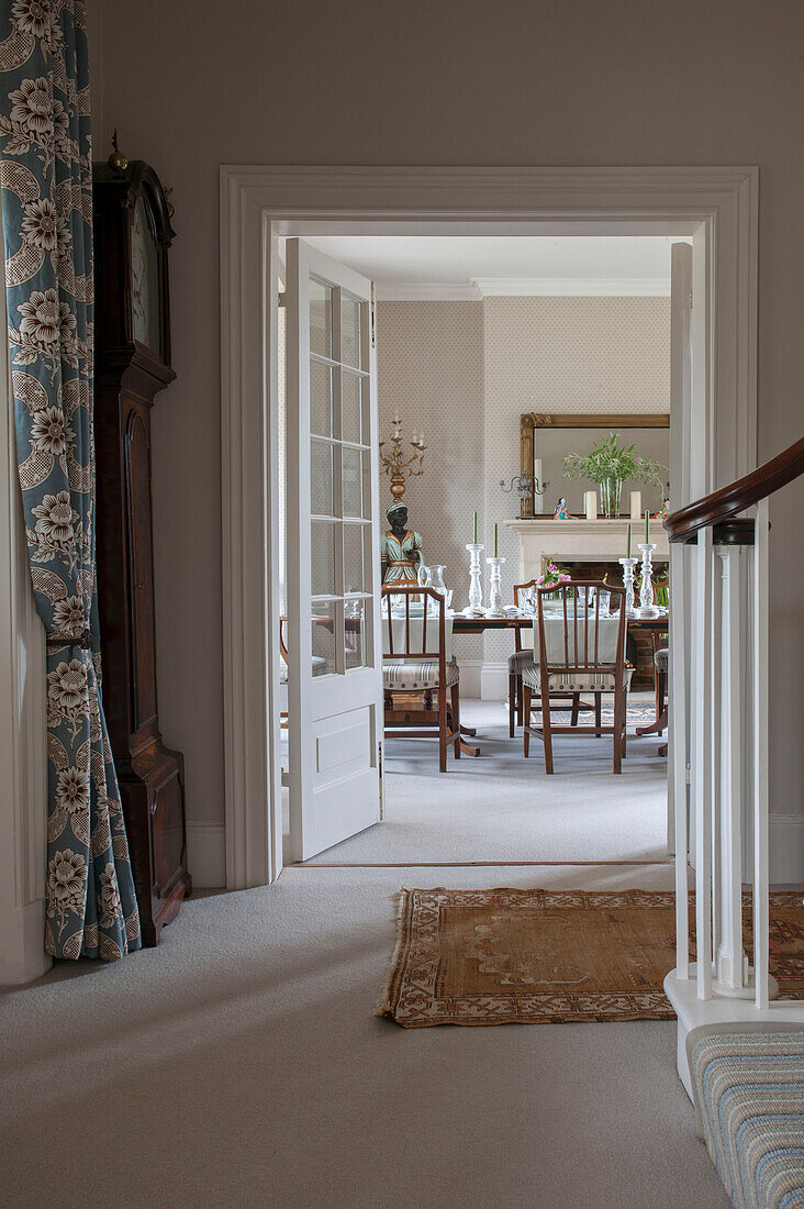 View from Hallway through to dining room with table set