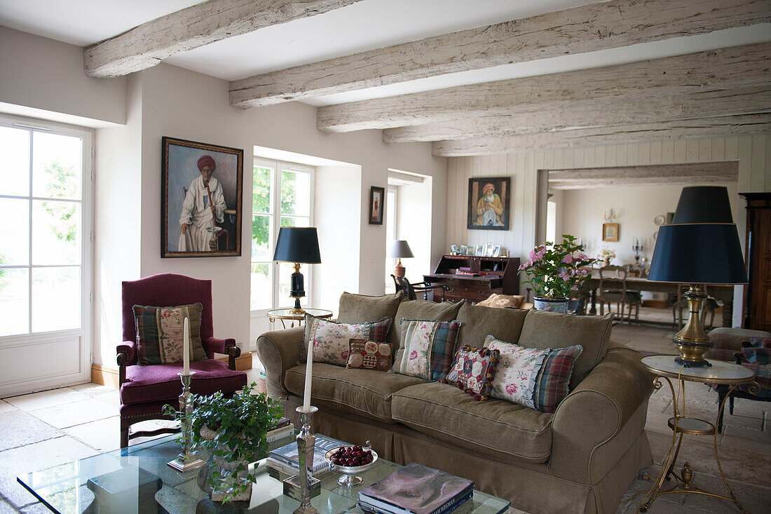 Open plan beamed living room in Dordogne  country residence  Perigueux  France