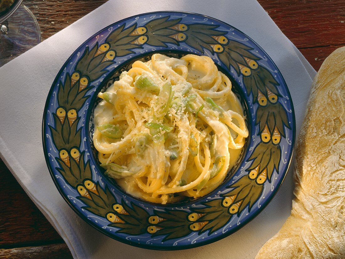Spaghetti with 3 kinds of cheese, cream sauce & spring onions