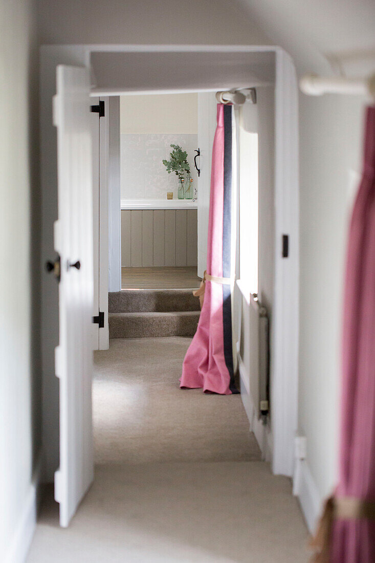 View through doorways to bathroom in Petworth farmhouse West Sussex Kent