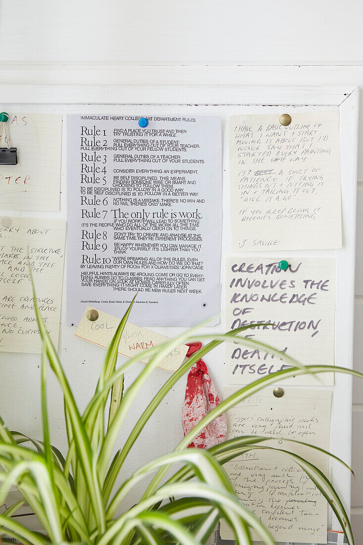 Handwritten reminders on noticeboard in Alloa home  Scotland  UK