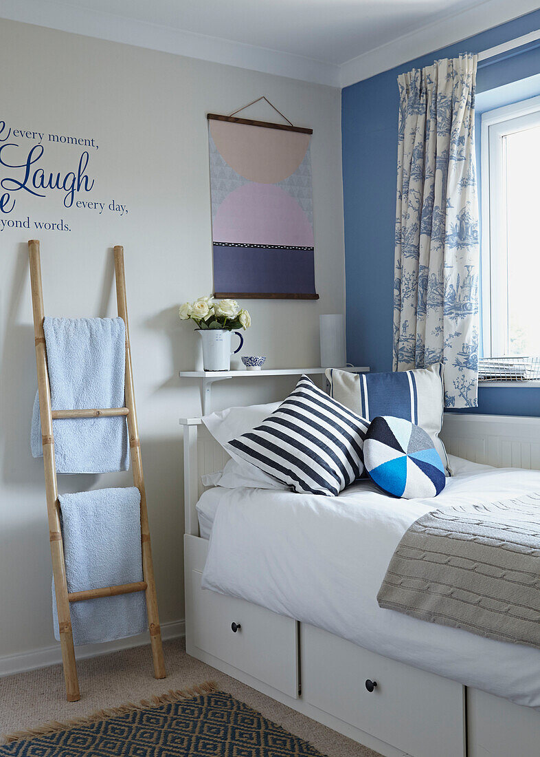 Nautically themed single bedroom with storage drawers in Bolton home,  Greater Manchester,  England,  UK