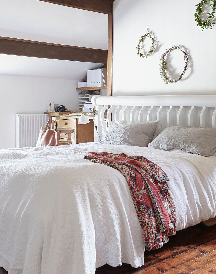 Oriental bathrobe on double bed in West Yorkshire farmhouse  UK