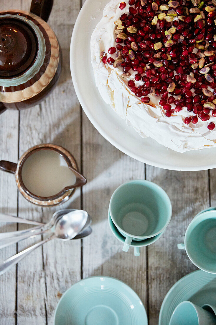 Teacups and cranberry meringue in Rochester kitchen  Kent  UK