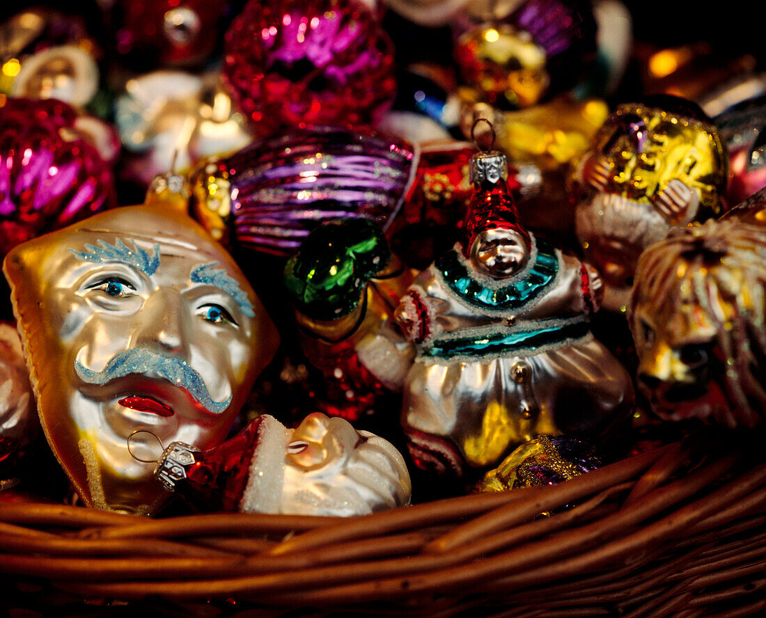 Woven basket of brightly coloured decorations