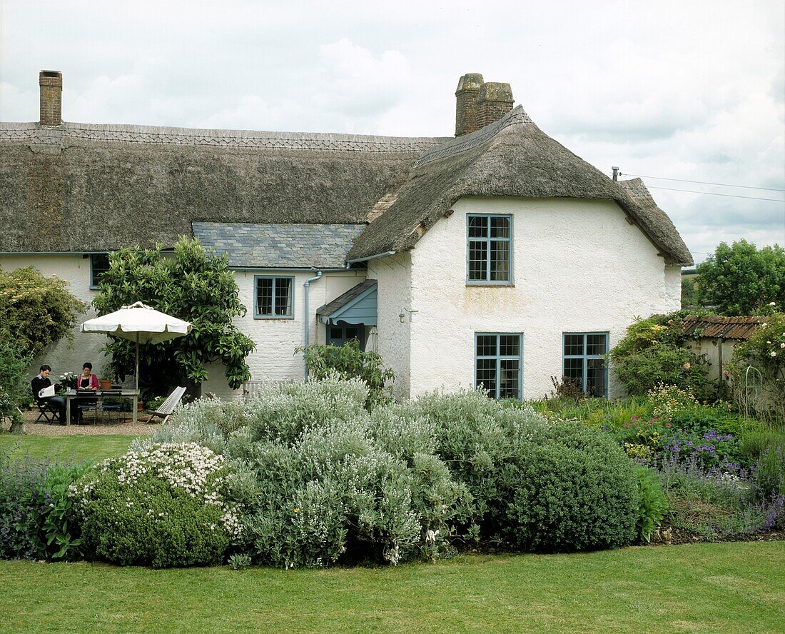 Garden view of thatched farmhouse 