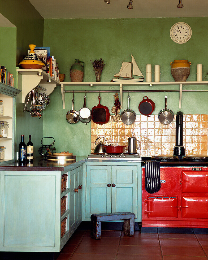 Marine styled kitchen with red range oven