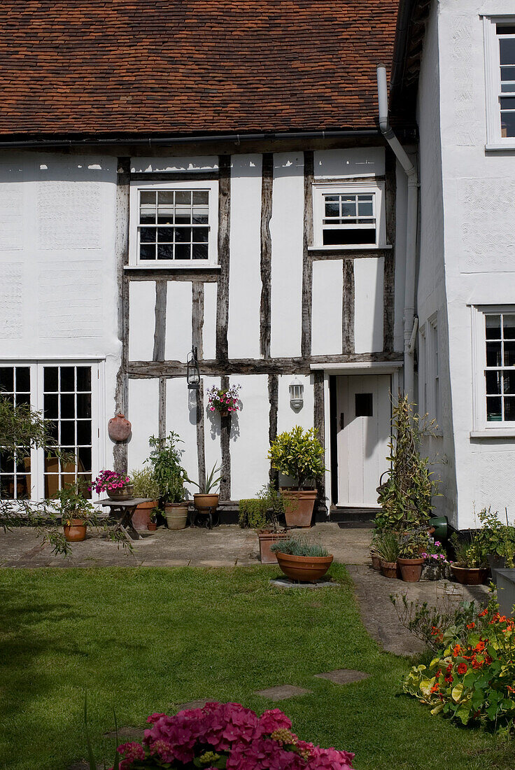 Exterior of period property with terracotta pots