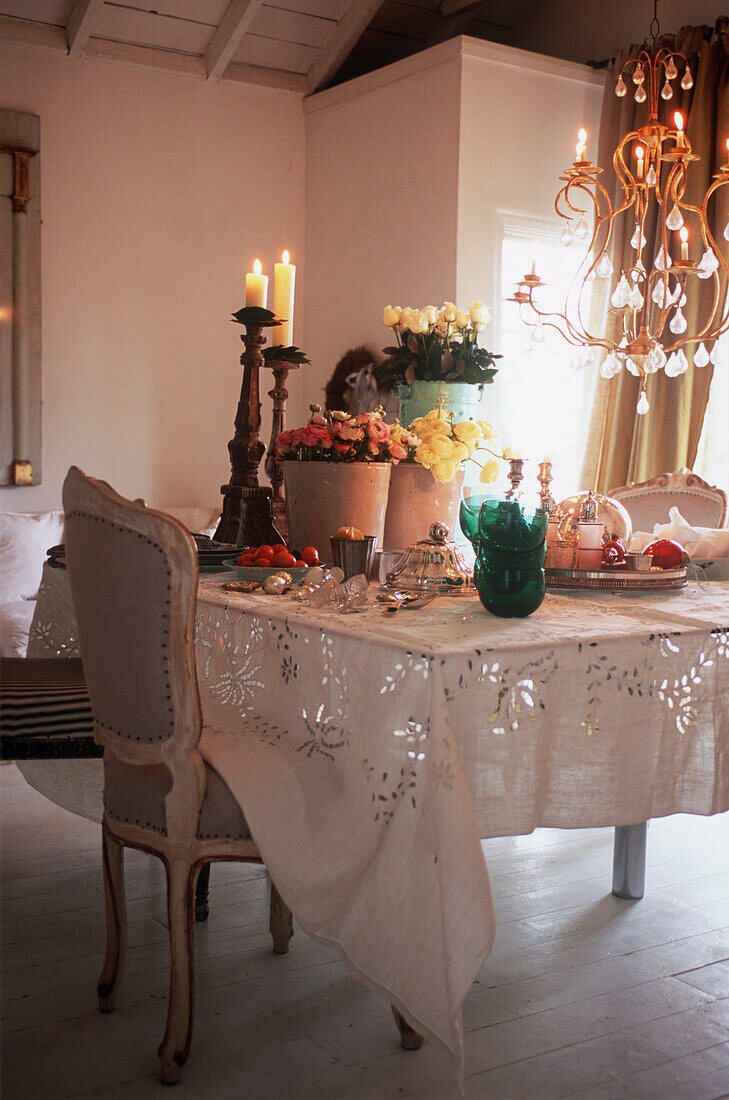 Chandelier over dining room table