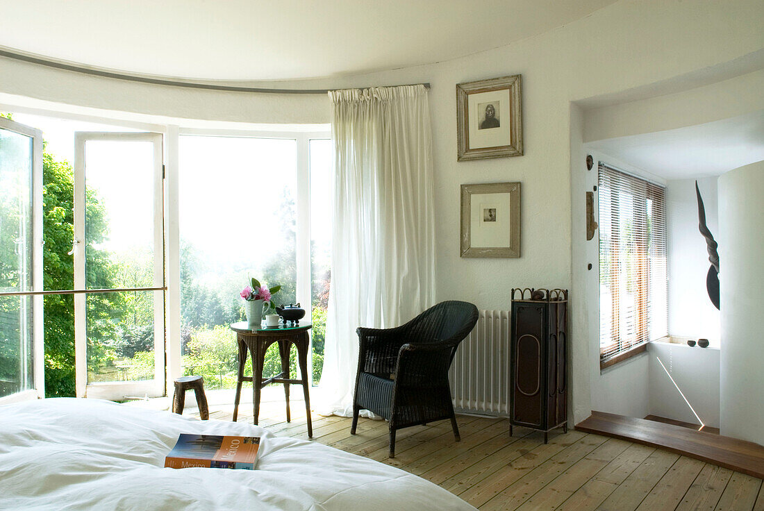 Modern bedroom with open patio doors