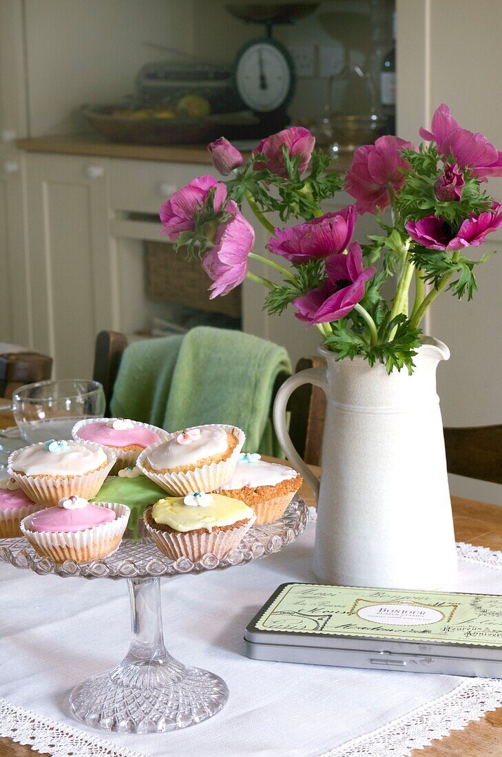 Dessert on table decorated with fresh flowers