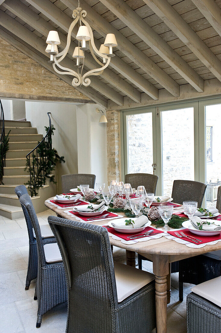 Dining table set for Christmas dinner in Wiltshire farmhouse