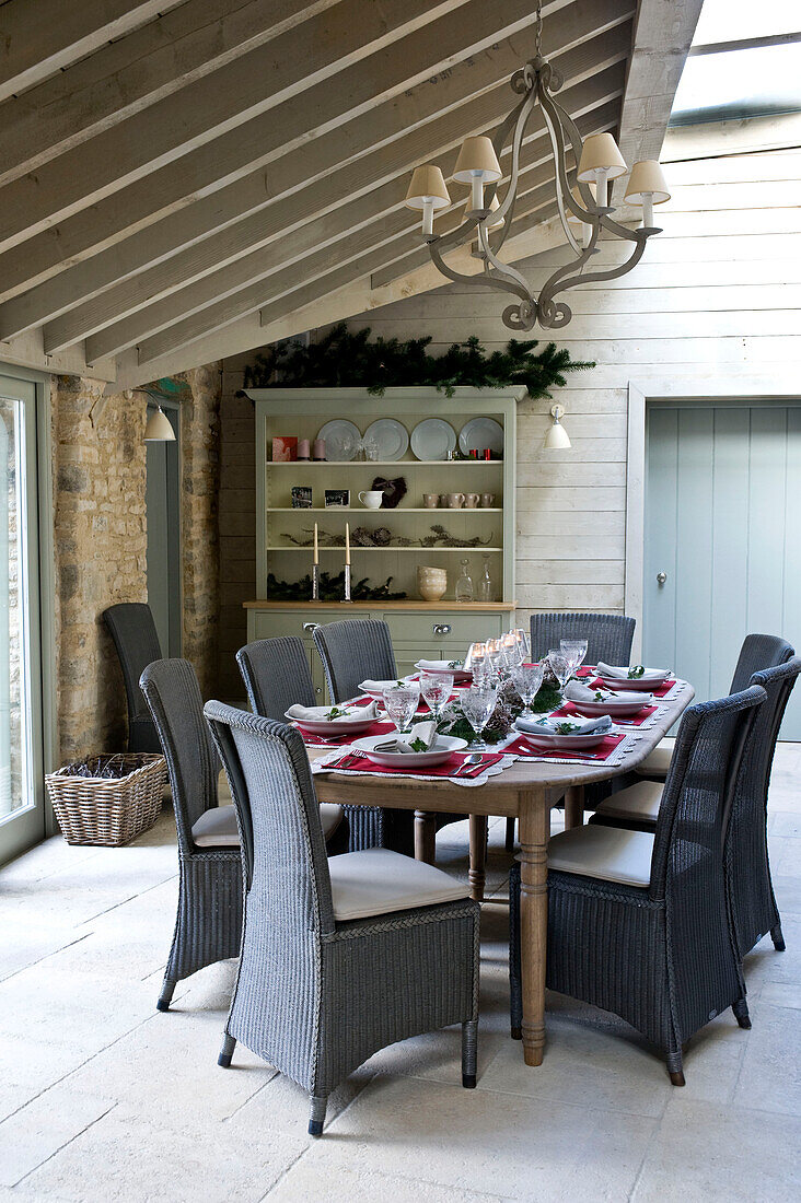 Dining table set for Christmas dinner in Wiltshire farmhouse