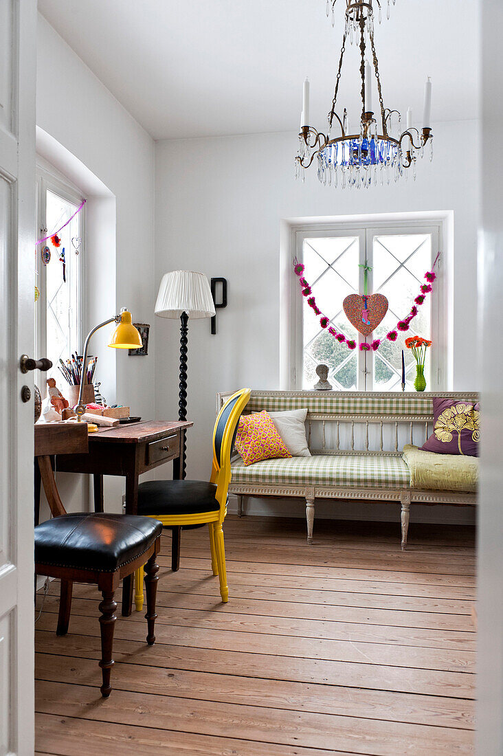 Desk and chair in bright study of modern Odense family home Denmark