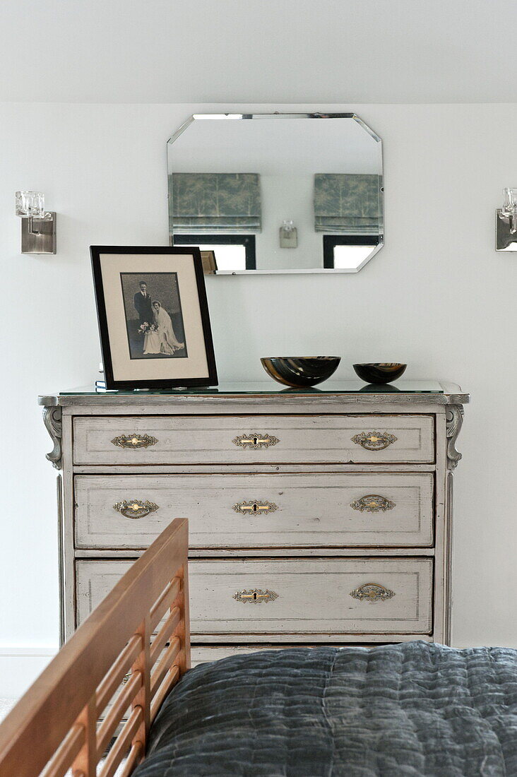 Framed photograph on chest of drawers in bedroom of London home, England, UK