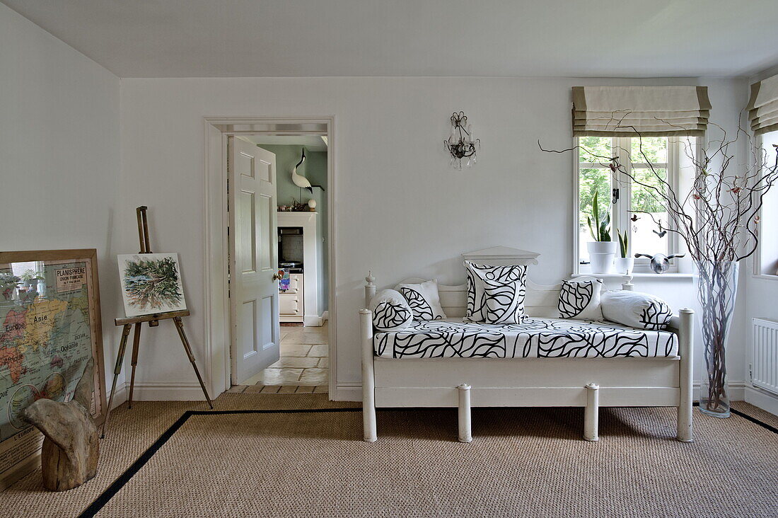 Black and white fabric on daybed in contemporary Suffolk/Essex home, England, UK