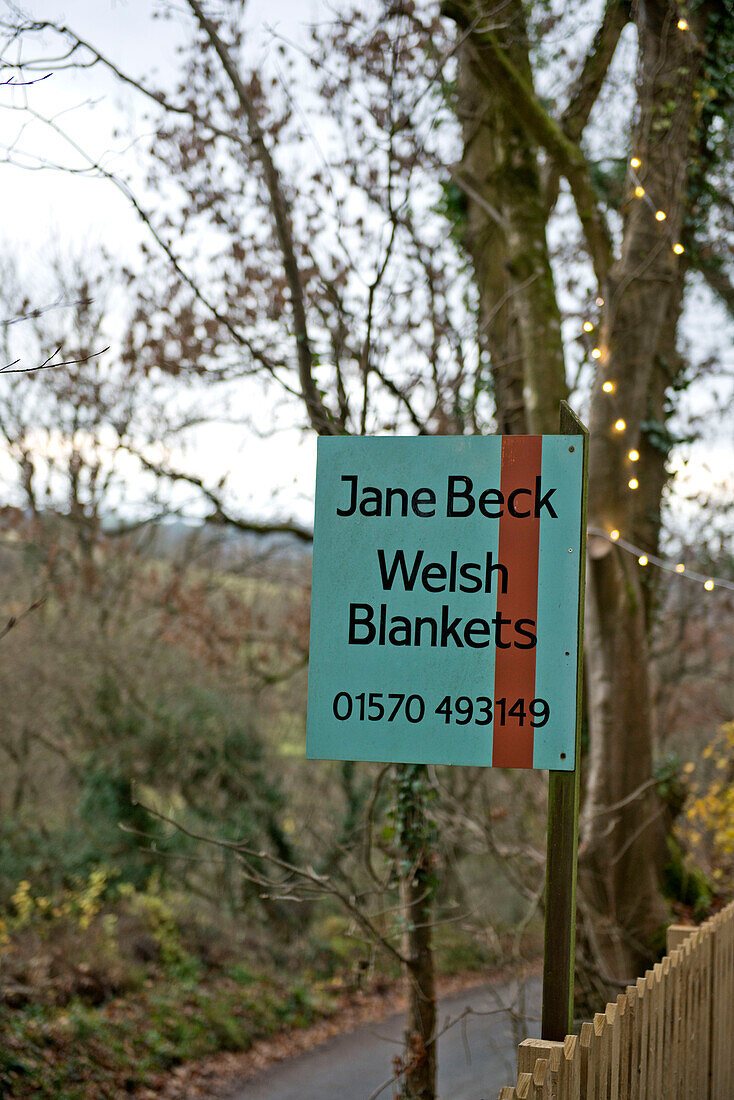 Signpost advertising Welsh blankets in Tregaron Wales UK