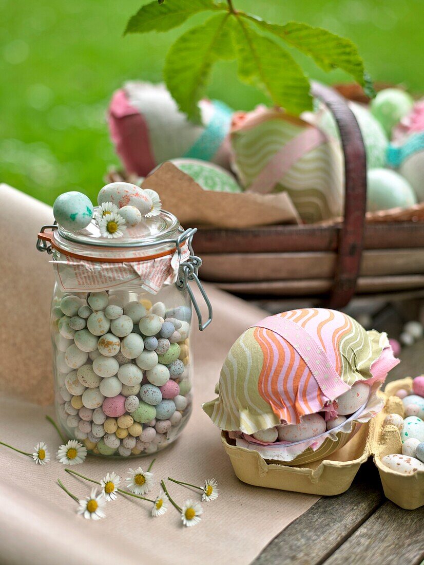 Easter eggs and daisies on Sussex garden table UK