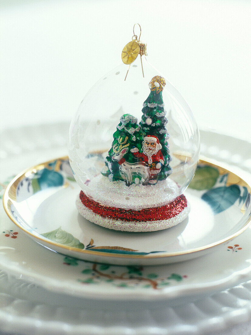 Snowglobe on saucer