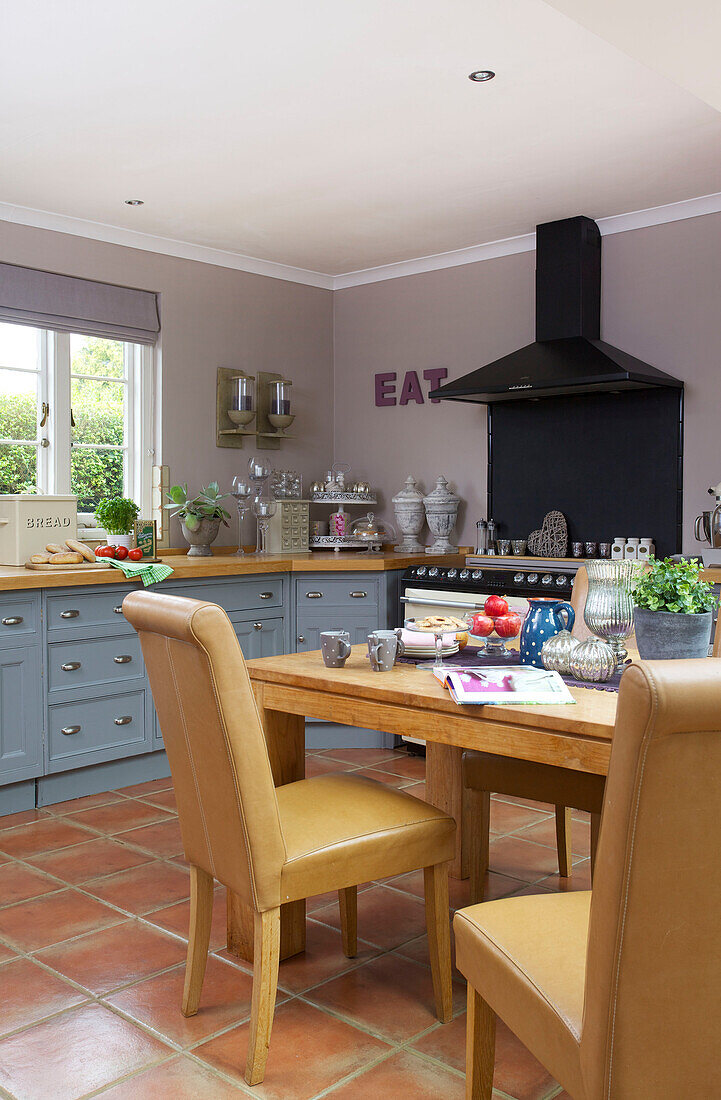 Table and chairs in light blue fitted kitchen Staplehurst kitchen Kent England UK