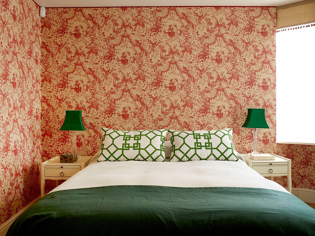 Contrasting pattern and colour designs in London bedroom, UK