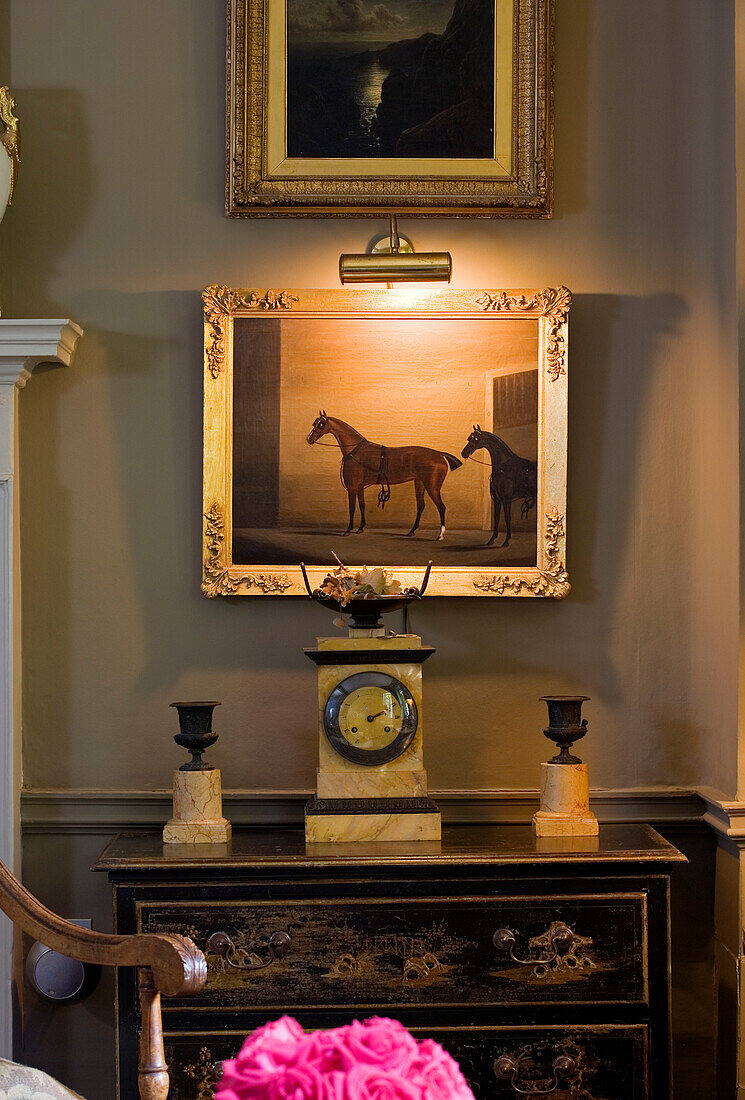Picture light and oil painting of horse in Epsom home Surrey UK